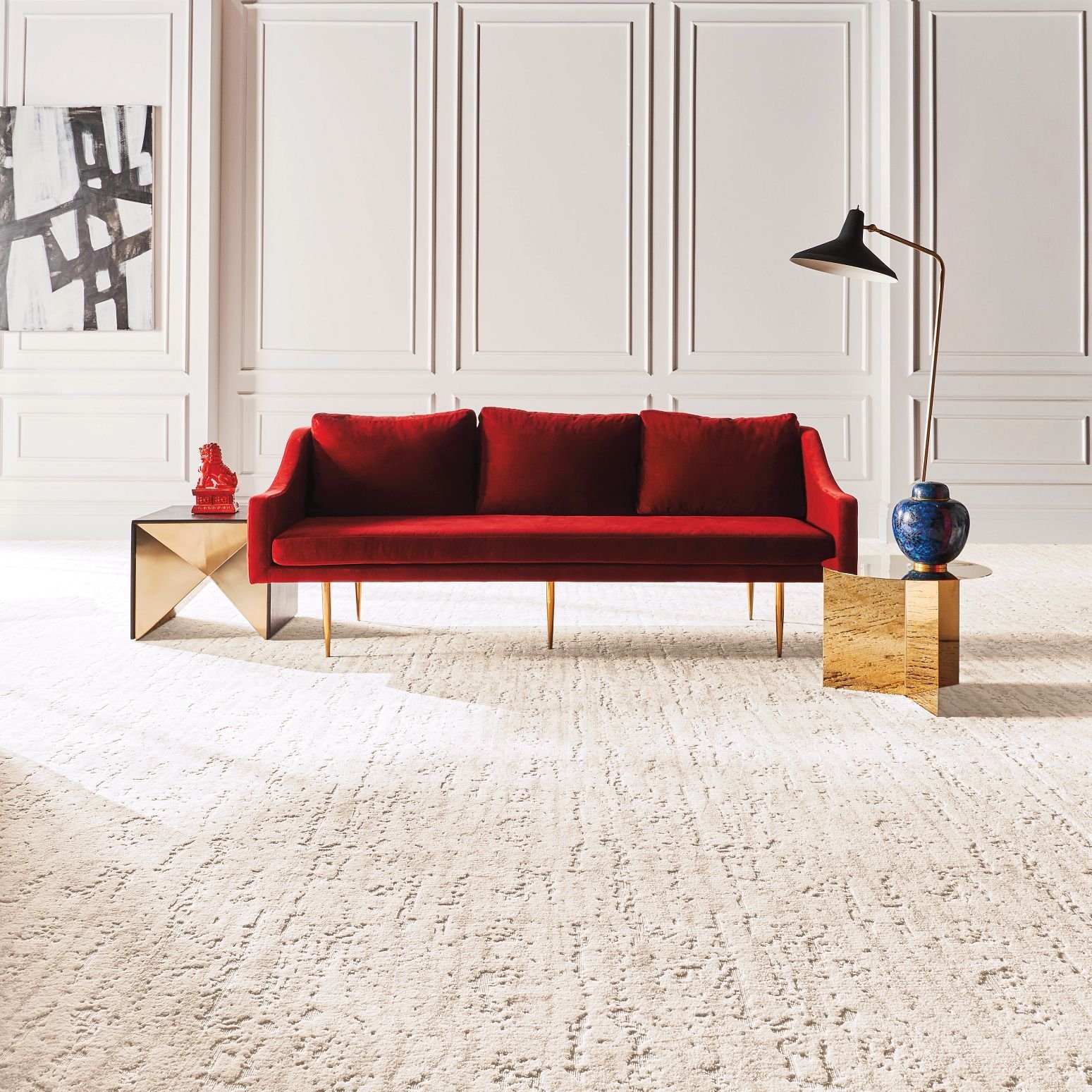 red sofa on carpet - contractorscarpetsource